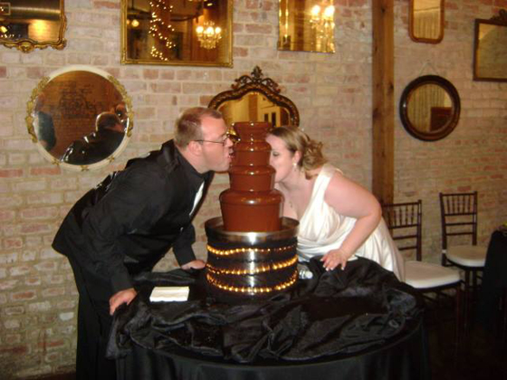 Bride and Groom Enjoying a Chocolate Fountain